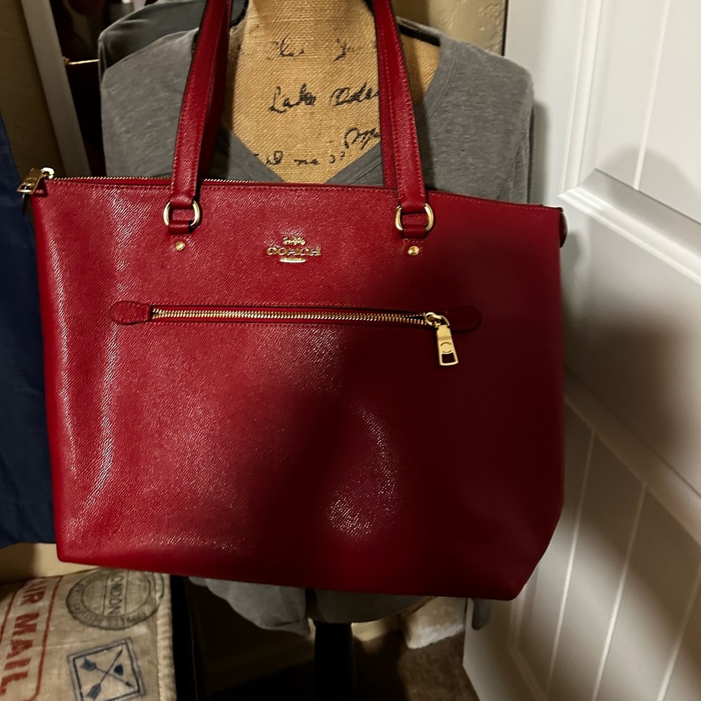 Coach red leather bag great for the holidays.